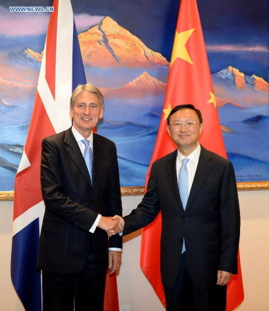 Chinese State Councilor Yang Jiechi (R) and British Foreign Secretary Philip Hammond co-chair a strategic dialogue between China and Britain in Beijing, capital of China, Aug. 13, 2015. (Photo: Xinhua/Zhang Ling)