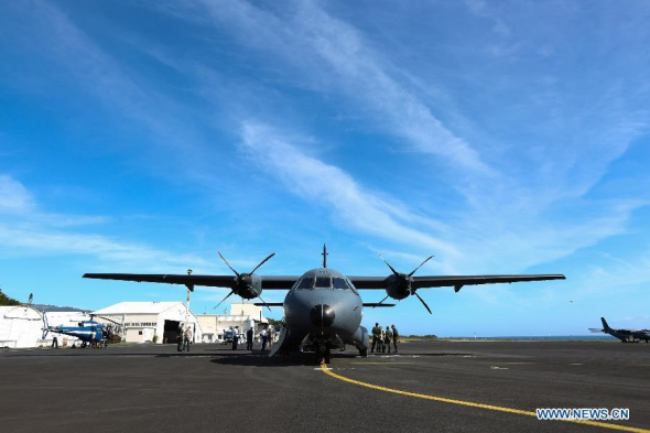 A CASA search plane taking part in the searching mission is seen at an airport in Saint Denis, La Reunion, Aug. 14, 2015. (Photo: Xinhua/Pan Siwei)