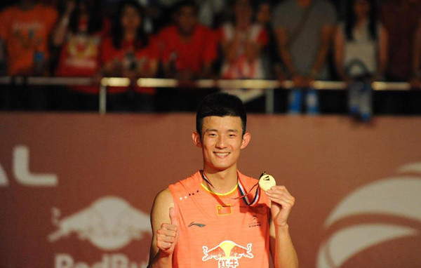 Chen Long defeates Malaysia's Lee Chong-wei to win the gold medal in men's singles at the Badminton World Championships in Jakarta, Indonesia on August 16, 2015. (Photo/Xinhua)