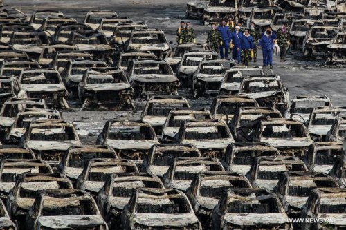 Rescuers work at the explosion site in north China's Tianjin Municipality, Aug. 16, 2015. (Photo: Xinhua/Zheng Huansong)