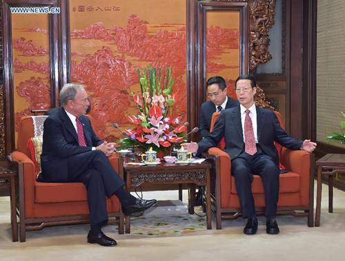 Chinese Vice Premier Zhang Gaoli (R, front) meets with founder of Bloomberg L.P. and UN Secretary-General Ban Ki-moon's special envoy for cities and climate change Michael Bloomberg in Beijing, capital of China, Aug. 18, 2015. (Xinhua/Li Tao)  