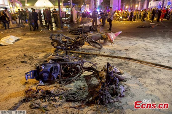 Motorcycles lie on the street at the scene of a bomb attack near Erawan Shrine, central Bangkok, Thailand, Aug 17, 2015.