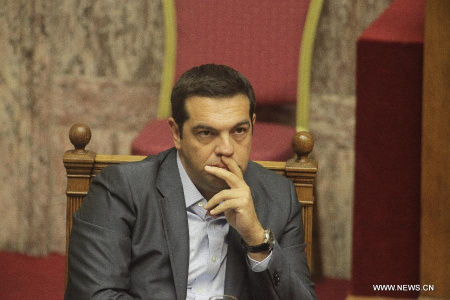 File photo taken on Aug. 14, 2015 shows Greek Prime Minister Alexis Tsipras reacting in the parliament in Athens, capital of Greece. 