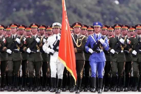 The file photo taken in 1999 shows the guard of honor of the three services of the PLA attending a parade to celebrate the 50th anniversary of the founding of the People's Republic of China in Beijing. (Photo/Xinhua)