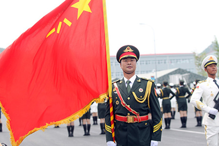 Flag bearer Zhang Hongjie will take part in the Sept 3 grand parade. (Photo: China Daily/Zhou Hong)