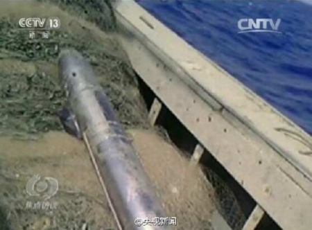 The machine is one-meter-long and looks like a torpedo. [Photo from screen shot of a program on CCTV