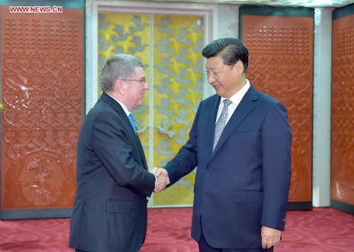 Chinese President Xi Jinping (R) meets with President of the International Olympic Committee (IOC) Thomas Bach in Beijing, capital of China, Aug. 22, 2015. (Xinhua/Li Tao)