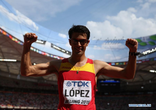 Spain's Miguel Angel Lopez celebrates winning the men's 20km race walk final at the 2015 IAAF World Athletics Championships in Beijing, capital of China, on Aug. 23, 2015. (Xinhua/Wang Lili)