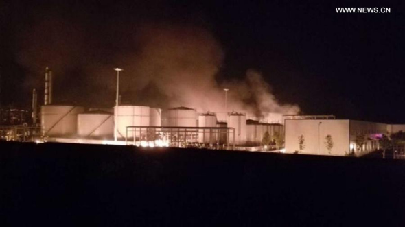 Photo taken on Aug. 22, 2015 shows a fire triggered by an explosion at a chemical plant in Huantai County, east China's Shandong Province. A blast ripped through a chemical plant in Huantai on Saturday night. (Photo/Xinhua)