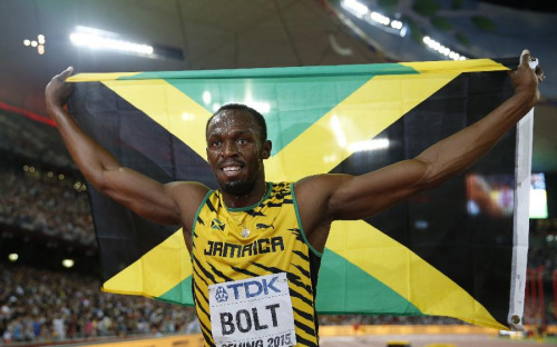 Jamaica's Usain Bolt celebrates after winning the men's 100m final at the 2015 IAAF World Championships in Beijing, capital of China, on Aug. 23, 2015. (Photo: Xinhua/Wang Lili)