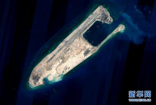 This satellite image released on Wednesday shows the Fiery Cross Reef where the reclamation project has been completed. (Photo/Xinhua)