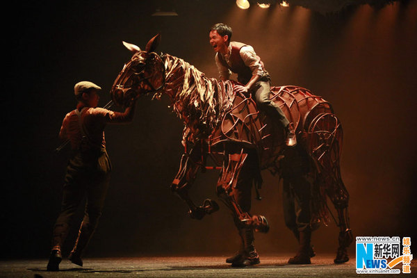 A stage photo from the Chinese version of War Horse. (Photo/Xinhua)