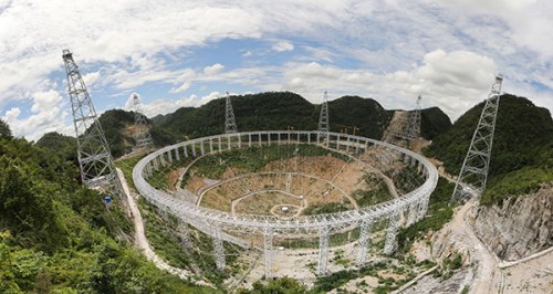 An overview of the 500-meter aperture spherical radio telescope. Still being built, it will be the world's largest radio telescope after it is completed in September 2016. (Zeng Jun/China Daily)
