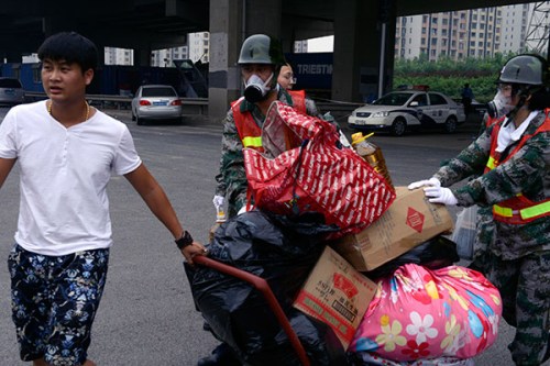 Residents that lived near the Tianjin Port blast site were forced to leave their homes because of toxic fumes. (Jia Guorong/For China Daily)