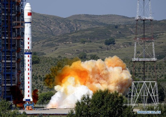 A Long March-4C rocket carrying the Yaogan-27 remote sensing satellite blasts off from the launch pad at the Taiyuan Satellite Launch Center in Taiyuan, capital of north China's Shanxi Province, Aug. 27, 2015. The satellite will mainly be used for experiments, land surveys, crop yield estimates and disaster prevention. (Photo: Xinhua/Yan Yan)