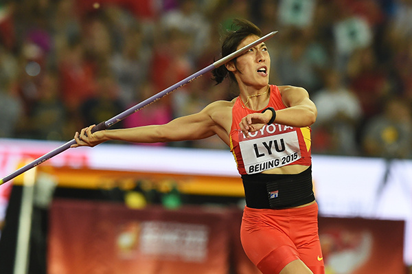 Javelin thrower Lyu Huihui is on her way to a silver medal, which she won with a throw of 66.13m.WEI XIAOHAO/CHINA DAILY