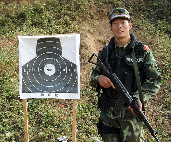 Zhang Nan, shown training in 2010, was a security officer at the Chinese embassy in Somalia. He was killed during a suicide attack at the Jazeera Palace Hotel on July 26. Lu Yaqi / Xinhua