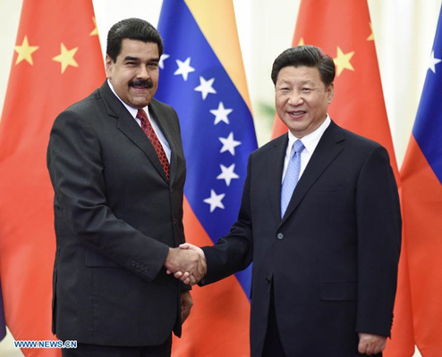 Chinese President Xi Jinping (R) meets with Venezuelan President Nicolas Maduro in Beijing, capital of China, Sept. 1, 2015. (Photo: Xinhua/Li Xueren)