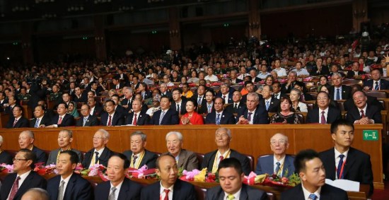 Chinese President Xi Jinping, Premier Li Keqiang and senior leaders Zhang Dejiang, Yu Zhengsheng, Liu Yunshan, Wang Qishan and Zhang Gaoli join about 6,000 people and watch a grand cultural gala to commemorate the 70th anniversary of the victory of the Chinese People's War of Resistance Against Japanese Aggression and the World Anti-Fascist War, in Beijng, capital of China, Sept. 3, 2015. (Photo: Xinhua/Lan Hongguang)