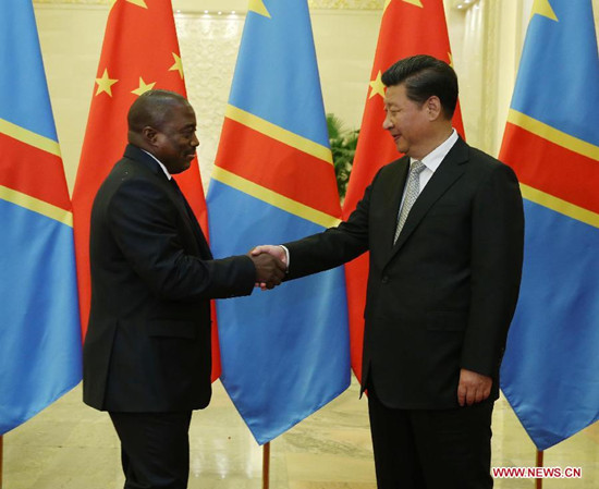 Chinese President Xi Jinping (R) meets with Joseph Kabila, president of the Democratic Republic of Congo, in Beijing, capital of China, Sept. 4, 2015. (Xinhua/Liu Weibing)