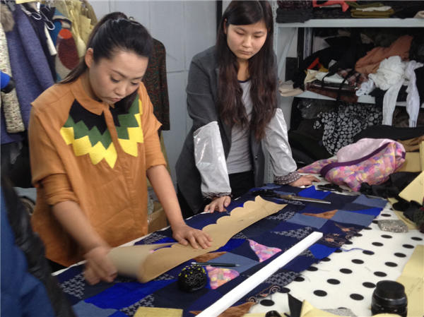 Zhang Na tries to prolong the lifespan of used clothes by redesigning them into fashion. Provided By Reclothing Bank