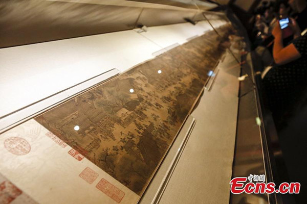 Aug. 27, Beijing, the real Riverside Scene at Qingming Festival paint was shown to media. It will be exhibited in a special exhibition at the Palace Museum from September 8. (CNS photo/ZHANG Hao)