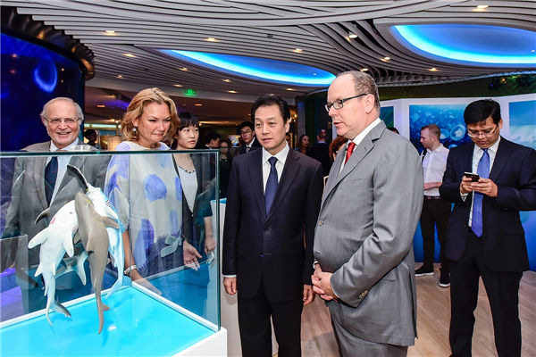 Prince Albert II of Monaco (right) attends a TEDx event on marine-ecosystem preservation in Beijing. Provided to China Daily