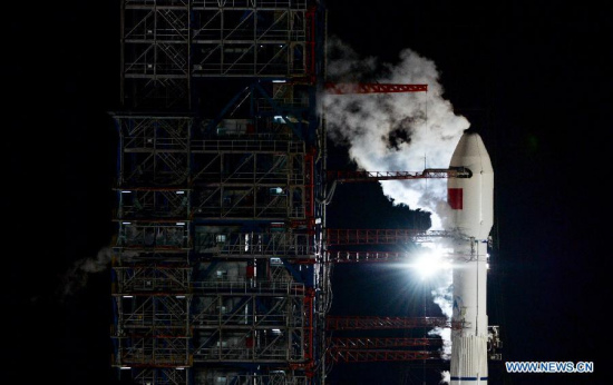 A Long March-3B carrier rocket carrying an communication technology experimental satellite prepares to be launched at the Xichang Satellite Launch Center in Xichang, southwest China's Sichuan Province, Sept. 12, 2015. The satellite will be mainly used to conduct a test on Ka frequency band in broadband communication. (Photo: Xinhua/Bai Yu)