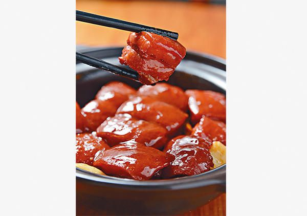 Brown-braised pork, a signature dish in Hunan cuisine. (Photo provided to China Daily)