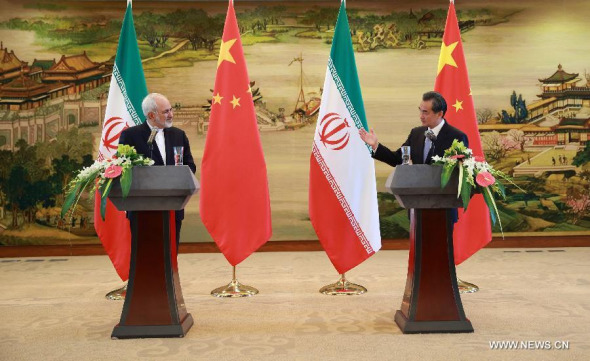 Chinese Foreign Minister Wang Yi (R) and Iranian Foreign Minister Mohammad-Javad Zarif attend a joint press conference after their talks in Beijing, capital of China, Sept. 15, 2015. (Photo: Xinhua/Ding Haitao) 