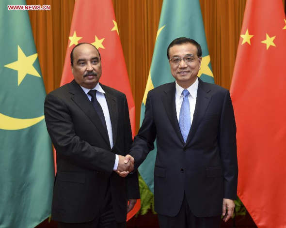Chinese Premier Li Keqiang (R) meets with Mauritanian President Mohamed Ould Abdel Aziz in Beijing, capital of China, Sept. 15, 2015. (Photo: Xinhua/Zhang Duo) 