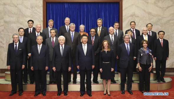 Chinese President Xi Jinping (C, front) meets with U.S. delegates attending the 7th China-U.S. business leaders' and former senior officials' dialogue at the Great Hall of the People in Beijing, capital of China, Sept. 17, 2015. (Photo: Xinhua/Huang Jingwen)