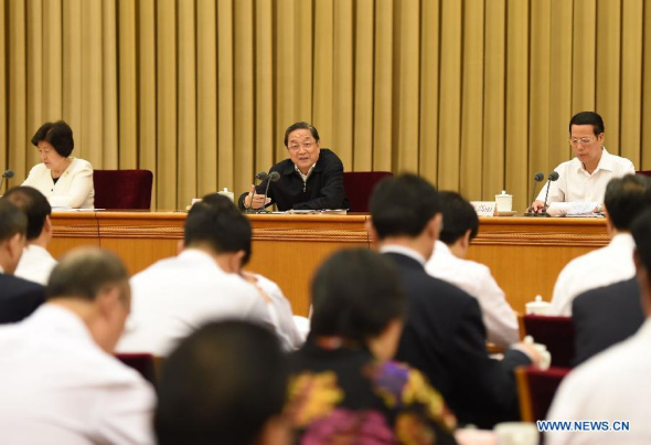 A conference on providing assistance in a bid to maintain stability and prosperity in northwest China's Xinjiang Uygur Autonomous Region is held in Beijing, capital of China, Sept. 23, 2015. Yu Zhengsheng (C back), chairman of the National Committee of the Chinese People's Political Consultative Conference (CPPCC) and Chinese Vice Premier Zhang Gaoli (R back) attended the conference here Wednesday.(Photo: Xinhua/Gao Jie)