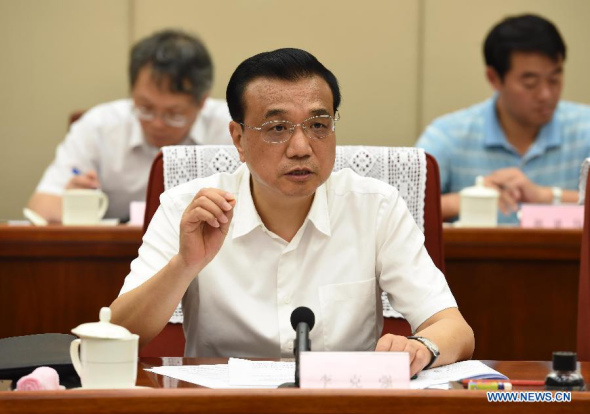 Chinese Premier Li Keqiang presides over a meeting on the investigation of the blasts that occurred in north China's Tianjin last month, in Beijing, capital of China, Sept. 22, 2015. (Photo: Xinhua/Rao Aimin)