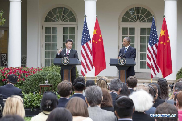 Chinese President Xi Jinping (L) and U.S. President Barack Obama meet with the press after their talks in Washington D.C., the United States, Sept. 25, 2015. (Photo: Xinhua/Huang Jingwen) 