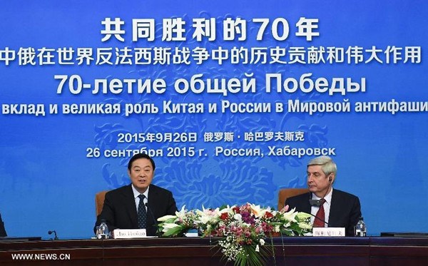 Liu Qibao (L), head of the Publicity Department of the CPC Central Committee, attends the international seminar titled 70-Year Common Victory together with Ivan Melnikov, vice chairman of the Communist Party of Russia in Khabarovsk, Russia, on Sept. 26, 2015. The seminar was co-organized by the Communist Party of China (CPC) and the Communist Party of Russia. (Photo: Xinhua/Dai Tianfang)