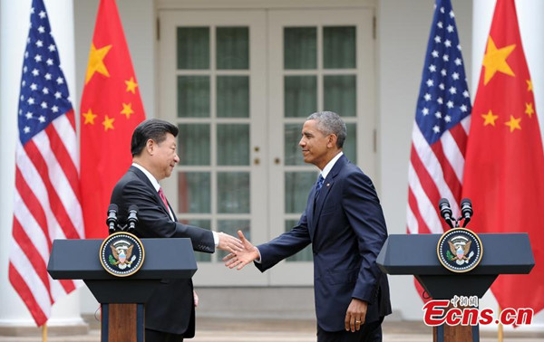 Chinese President Xi Jinping (L) and U.S. President Barack Obama meet with the press after their talks in Washington D.C., the United States, Sept. 25, 2015. (CNS photo/Mao Jianjun)