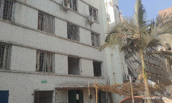 Photo taken on Sept. 30, 2015 shows the accident site after explosions took place in Liucheng County, south China's Guangxi Zhuang Autonomous Region. Three people have been confirmed dead and 13 others were injured in the blasts occurred at the seat of Liucheng county and the surrounding areas, with the first one heard at about 15:50. (Xinhua)