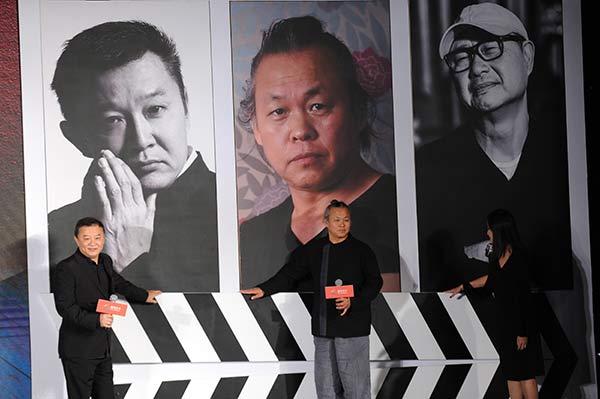 South Korean filmmaker Kim Ki-duk (center) announces in Beijing that his first Mandarin movie, Who Is God, is being financed by a Chinese film studio and will recruit an allChinese cast. Photo: China Daily/Jiang Dong)