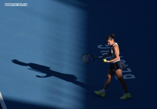 Flavia Pennetta of Italy reacts during the women's singles third round match against Anastasia Pavlyuchenkova of Russia at the China Open tennis tournament in Beijing, China, Oct. 8, 2015. Pennetta lost the match 1-2. (Photo: Xinhua/Li Wen)