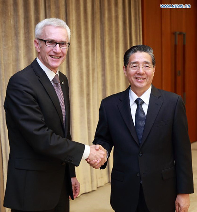 Chinese State Councilor and Minister of Public Security Guo Shengkun (R) meets with Secretary General of Interpol Jurgen Stock in Beijing, capital of China, Oct. 9, 2015. (Photo: Xinhua/Ding Haitao)