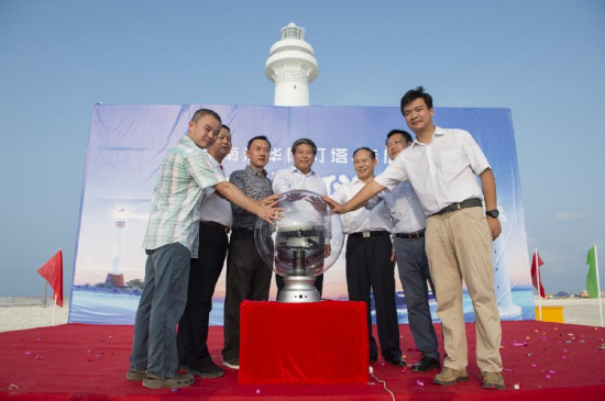 Guests attend a completion ceremony for the construction of Huayang and Chigua Lighthouses on Huayang Reef of China's Nansha Islands, Oct. 9, 2015, marking the start of the operation of the two lighthouses. (Photo: Xinhua/Chen Yichen)