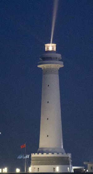Photo taken on Oct. 9, 2015 shows a lighthouse on Huayang Reef of China's Nansha Islands. The Ministry of Transport held a completion ceremony for the construction of Huayang and Chigua Lighthouses on Huayang Reef, marking the start of the operation of the two lighthouses. (Photo: Xinhua/Chen Yichen)