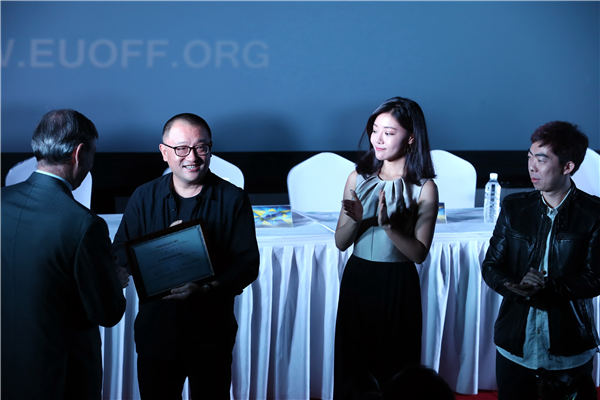 (From second left to right) Chinese director Wang Xiaoshuai, actress Deng Jiajia and director Lu Yang are invited as guests to the 2015 European Union Film Festival in China. (Photo provided to China Daily)
