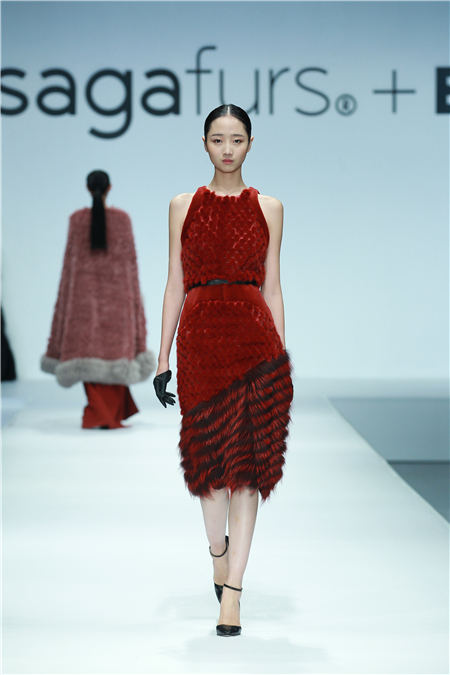 A model shows Saga Furs' fall/winter 2016 collection by international designers in Beijing. Photo provided to China Daily.