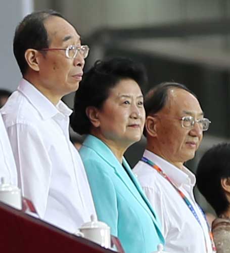 From left: You Quan, Party chief of Fujian province, Vice-Premier Liu Yandong and Minister of General Administration of Sports Liu Peng attend the opening ceremony of the first National Youth Games in Fuzhou on Sunday. HU MEIDONG/CHINA DAILY
