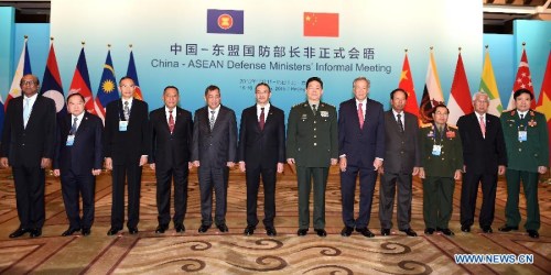 Chinese Defense Minister Chang Wanquan (6th R), defense ministers of ten ASEAN countries and deputy secretary general of ASEAN pose for a group picture during China-ASEAN Defense Ministers' Informal Meeting in Beijing, capital of China, Oct. 16, 2015. Chang chaired and made a keynote speech during the meeting. (Photo: Xinhua/Zhang Ling)