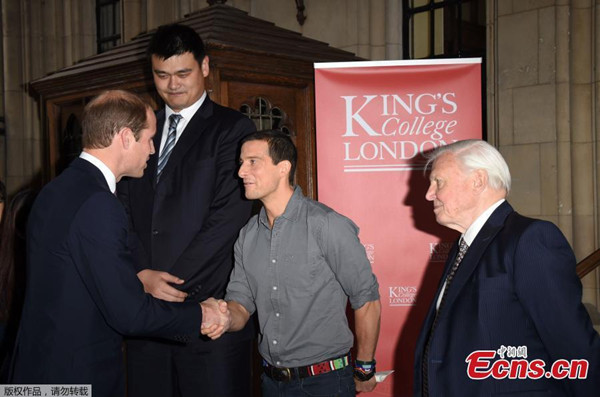 Prince William (L) meets explorer Bear Grylls(C), naturalist David Attenborough, and retired Chinese basketball player Yao Ming, prior to delivering a speech on the illegal wildlife Trade For China Central Television, at King's College, in London on Monday, Oct. 19, 2015. (Photo/Agencies)