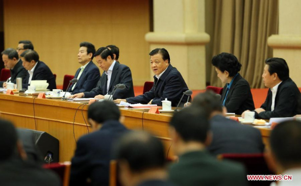 Liu Yunshan (3rd R, back), a member of the Standing Committee of the Political Bureau of the Communist Party of China Central Committee, addresses a meeting on promoting the prosperous development of China's literature and art industries in Beijing, capital of China, Oct. 20, 2015. (Photo: Xinhua/Liu Weibing)