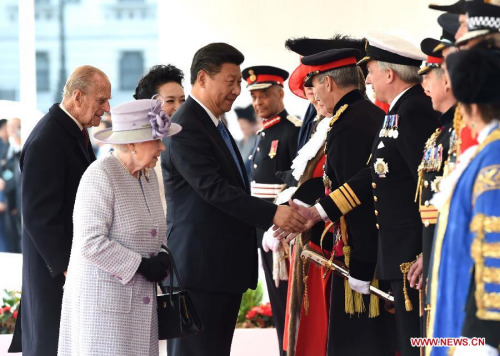 Visiting Chinese President Xi Jinping attends a traditional ceremonial welcome held by British Queen Elizabeth II in London, capital of Britain, Oct. 20, 2015. (Photo: Xinhua/Rao Aimin)